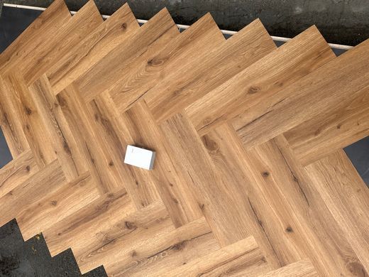 Vinilam Parquet Herringbone Дуб Бурштиновий, за м2