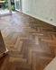 Invictus Maximus Herringbone Highland Oak Chocolate, за м2